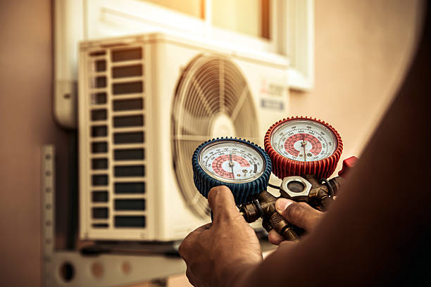 Professional Hvac technician working in Minot, ND
